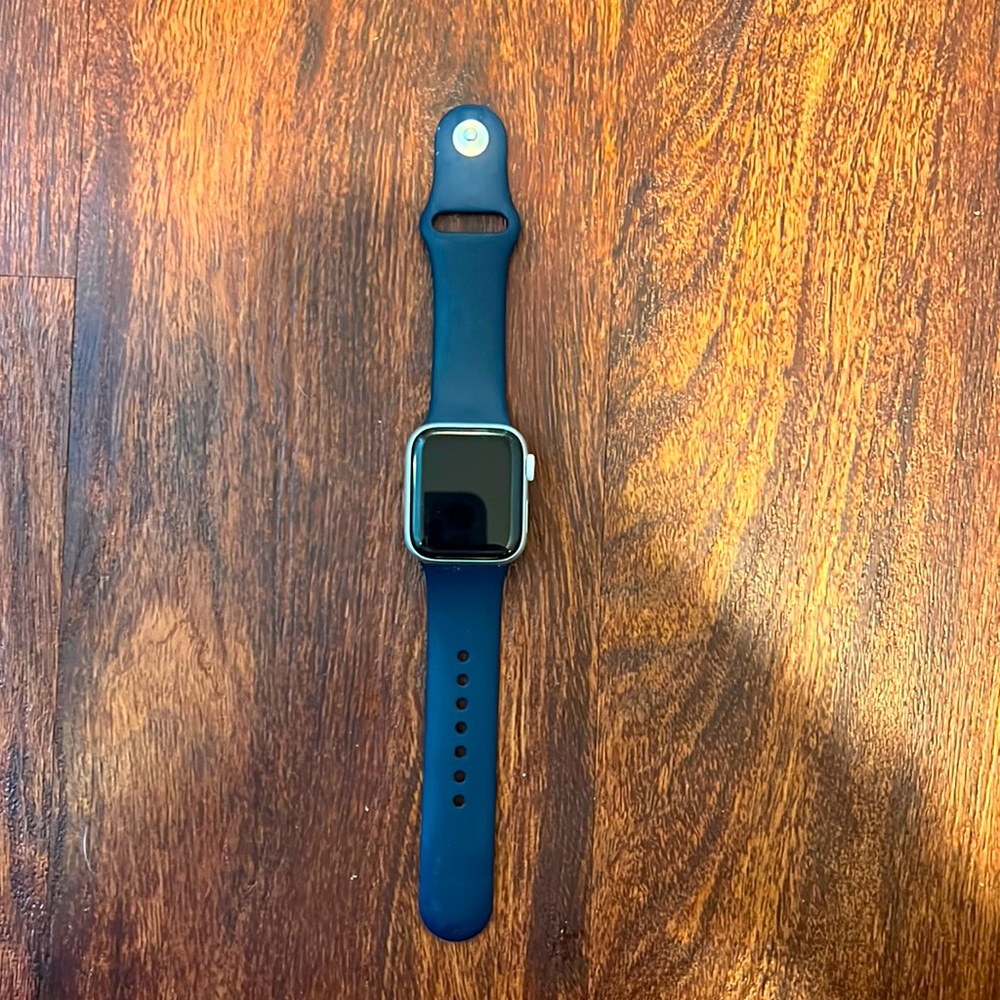 Apple Watch series 4. Silver. Cellular capability. Navy sport band.